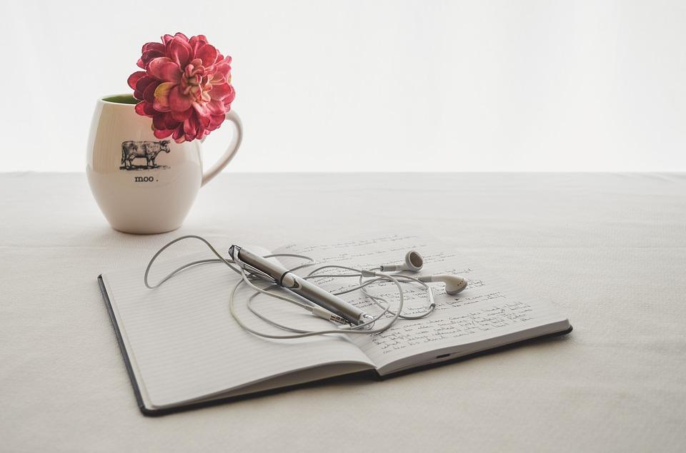Pink Flower, Journal, Earbuds, Pen, White Cup, Fitness